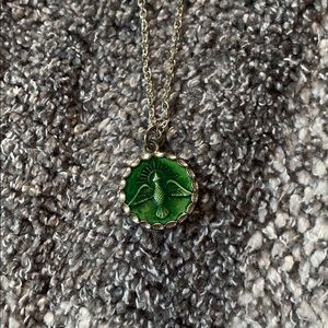 Silver necklace with green pendant